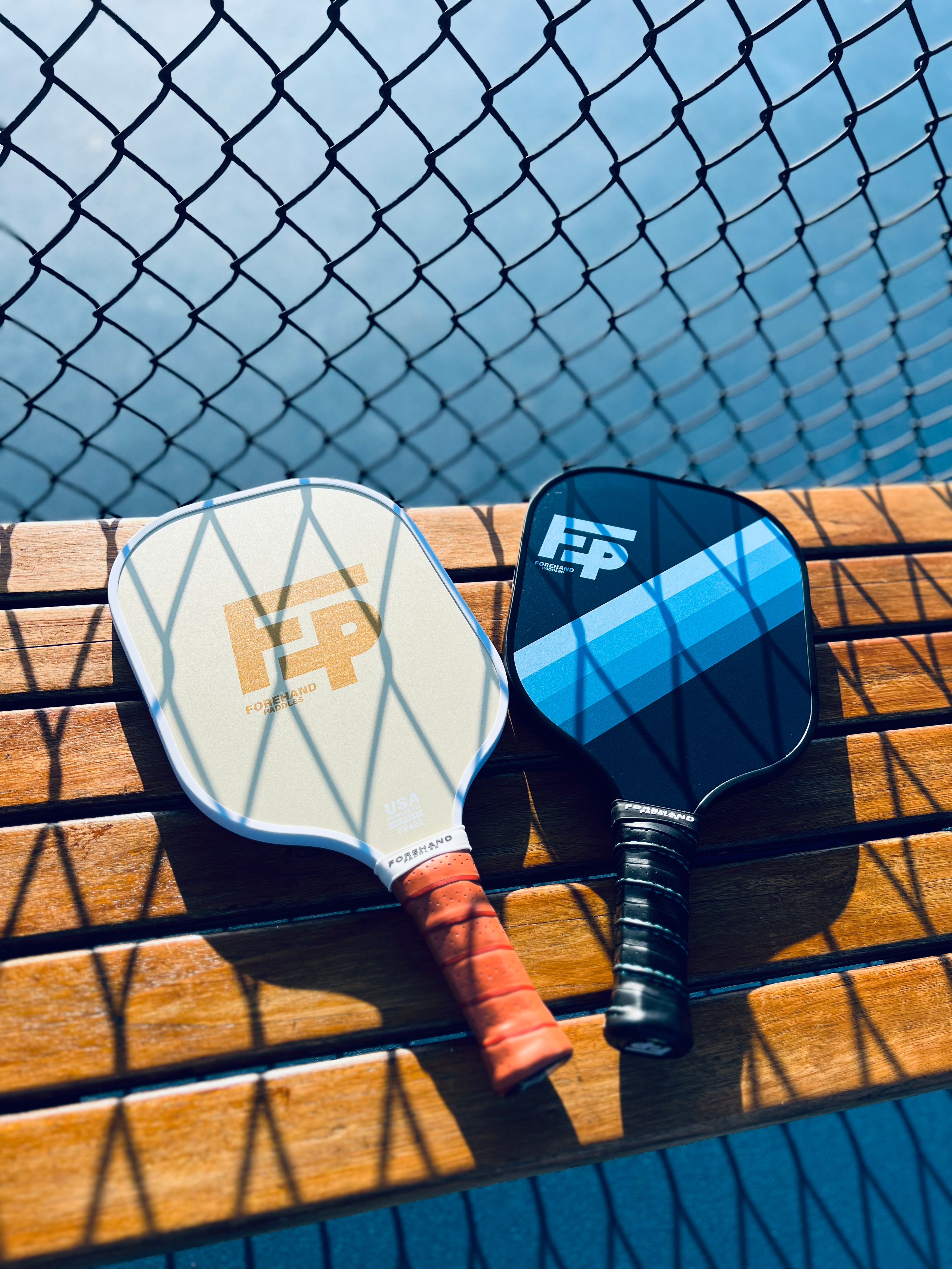 Forehand Paddles Orange Grove and Blue Knight Pickleball Paddles 